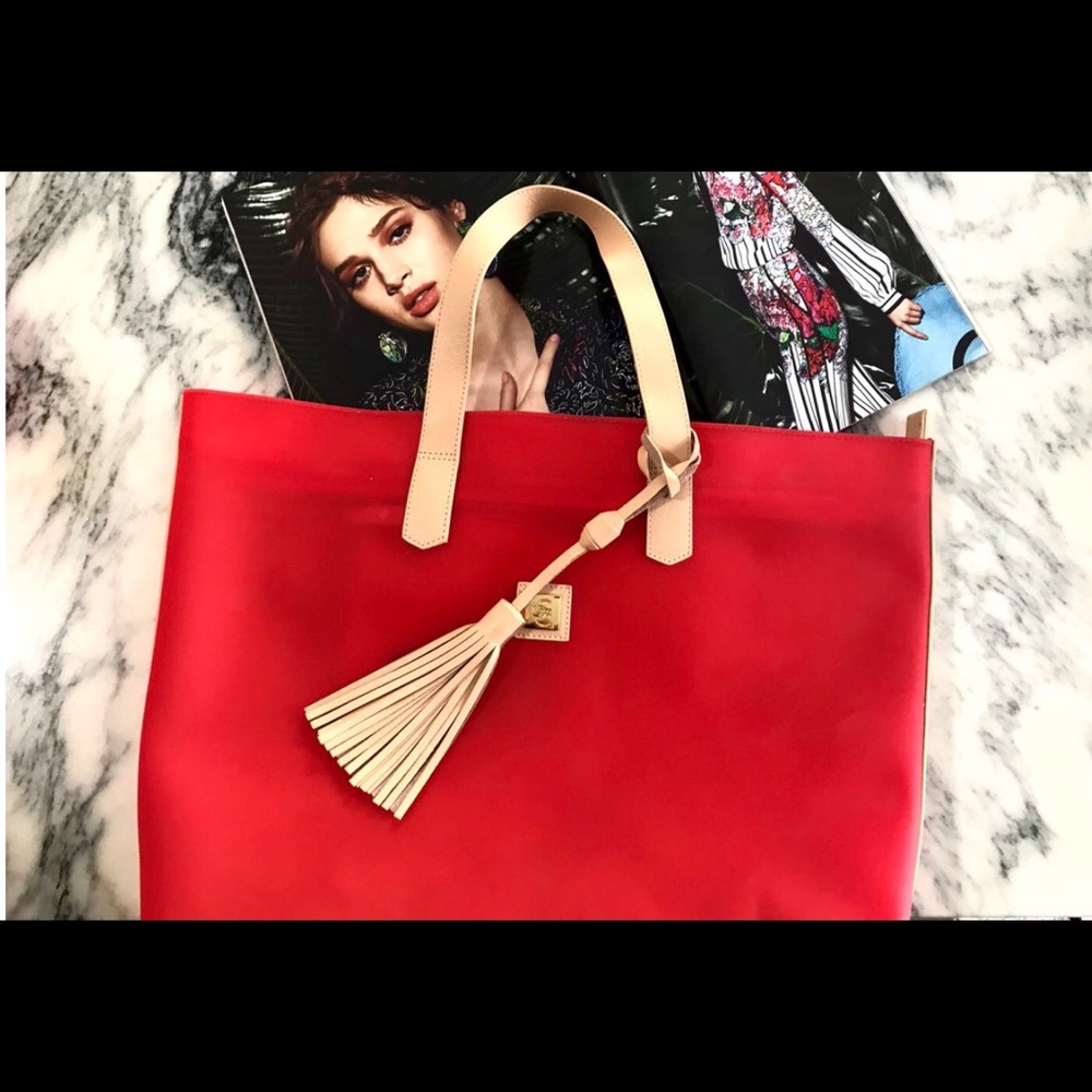 Red PVC with Leather straps, bottom & tassel!